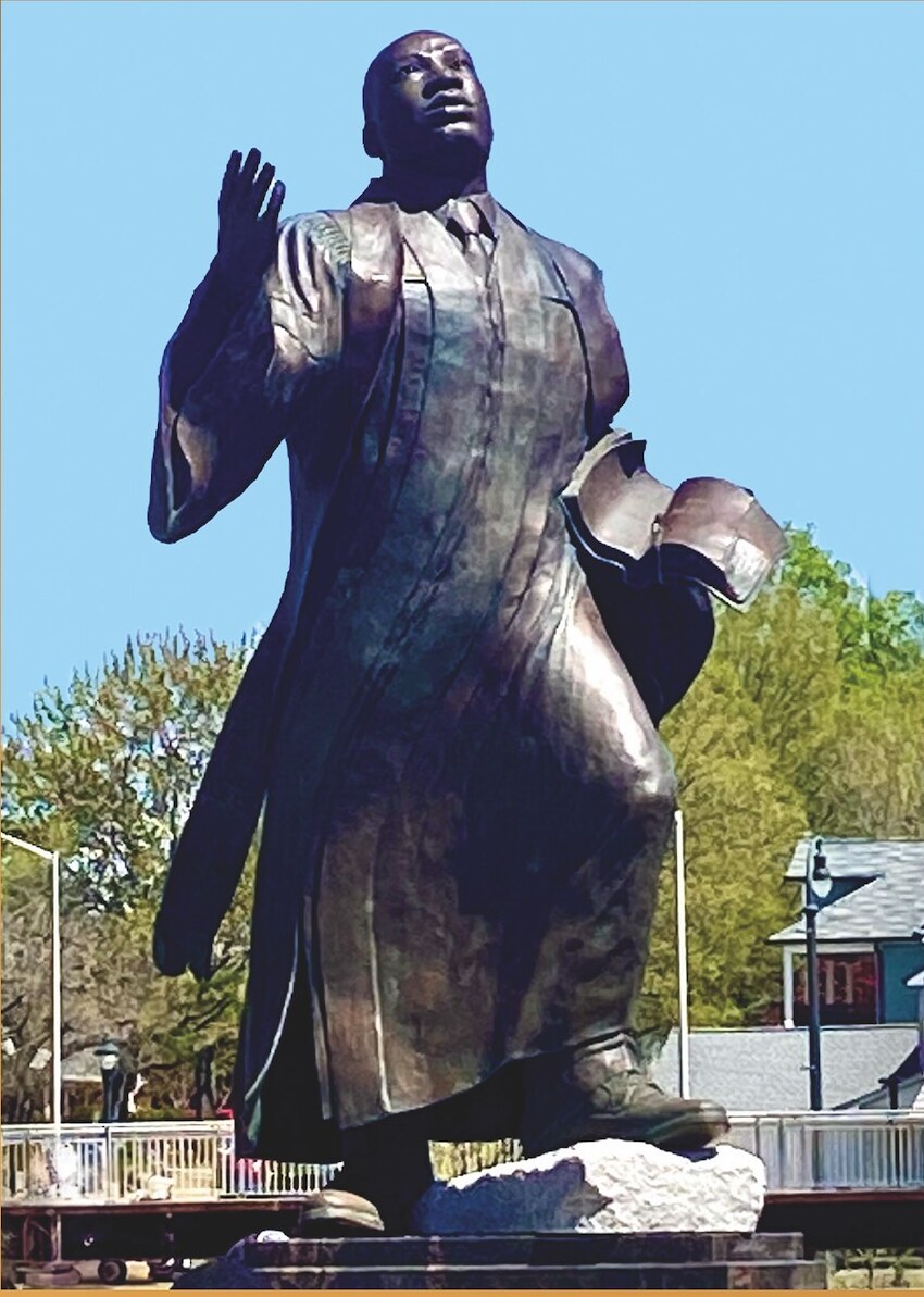 Bronze public monument of a standing figure