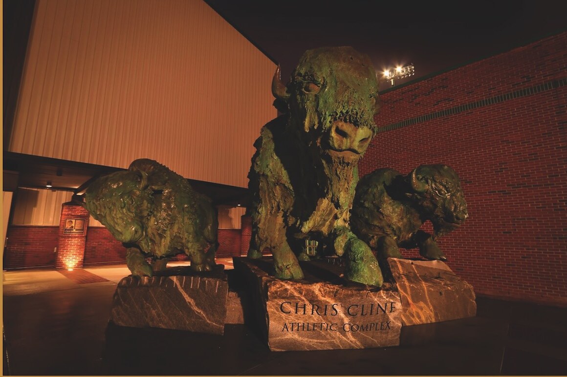 Finished sculptural group illuminated at night